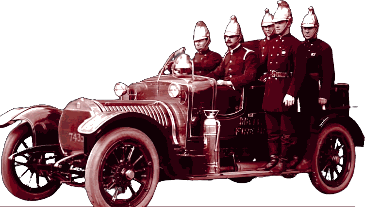 Firefighters in brass helmets aboard an early motor fire engine, from a historic photograph