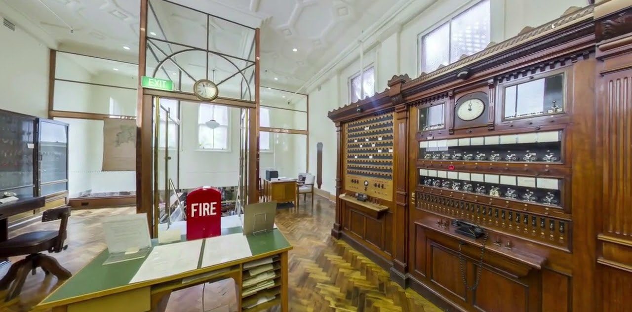 The watch room, with its timber alarm indicator boards, brass clock and duty desk